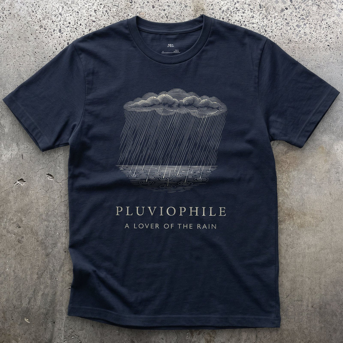 Pluviophile design on a Navy Gildan Softstyle t-shirt
