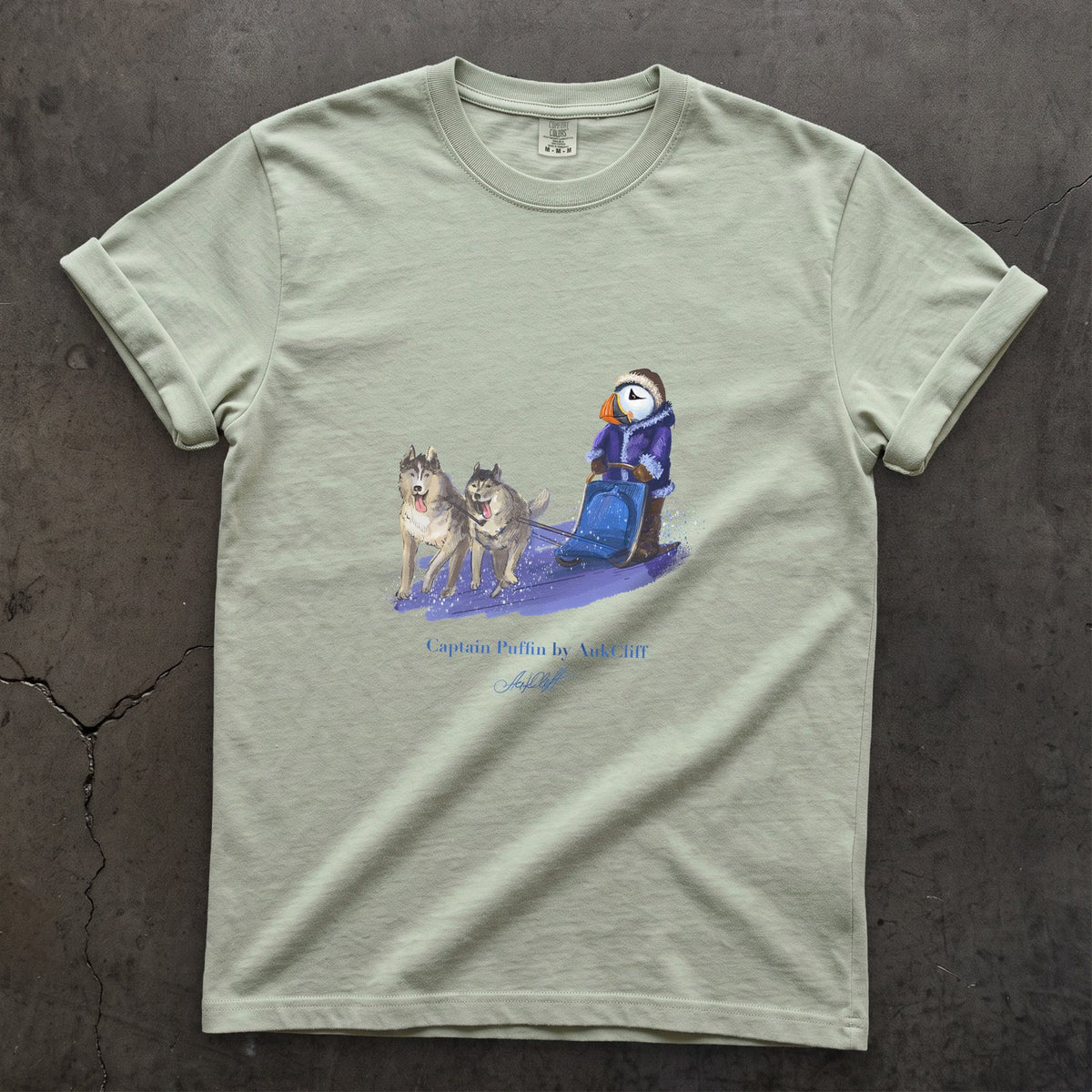 Captain Puffin Arctic Dog Sledder on a Bay Comfort Colors t-shirt