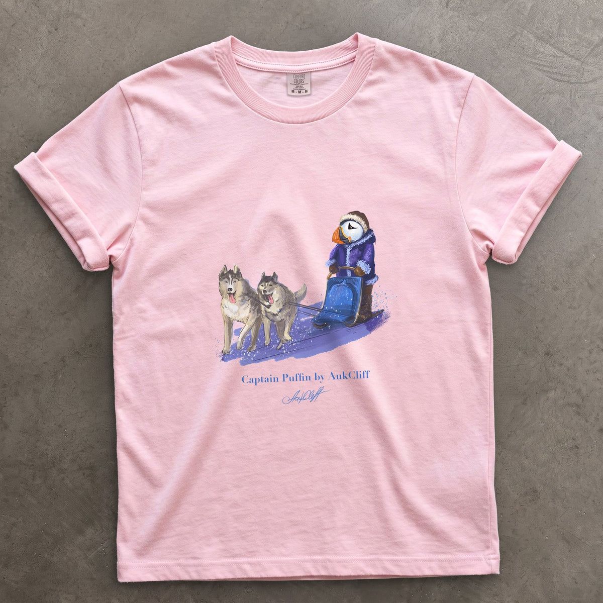 Captain Puffin Arctic Dog Sledder on a Blossom Comfort Colors t-shirt