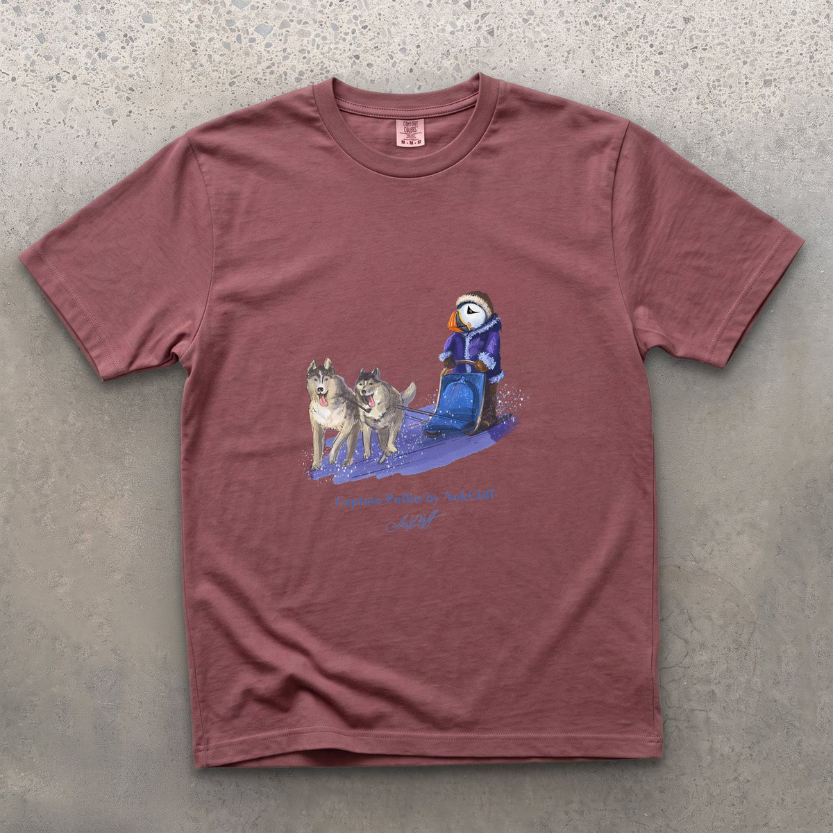 Captain Puffin Arctic Dog Sledder on a Brick Comfort Colors t-shirt