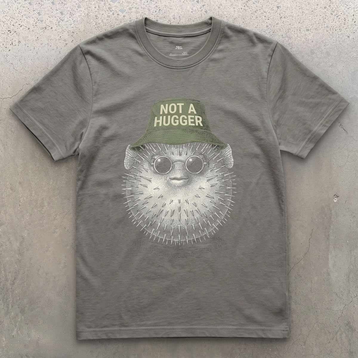 Not a Hugger, Reef Pufferfish in a Bucket Hat design on a Charcoal Gildan Softstyle t-shirt
