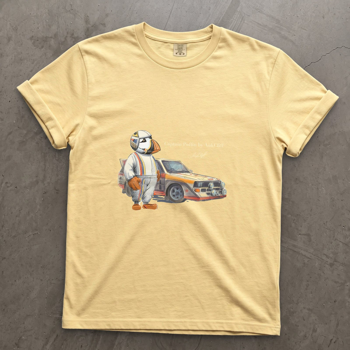 Captain Puffin Rally Driver on a Butter Comfort Colors t-shirt