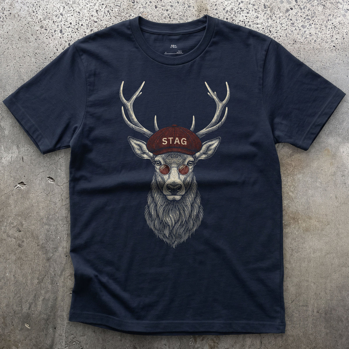 Stag, a Red Deer in a Flat Cap in the Wild design on a Navy Gildan Softstyle t-shirt
