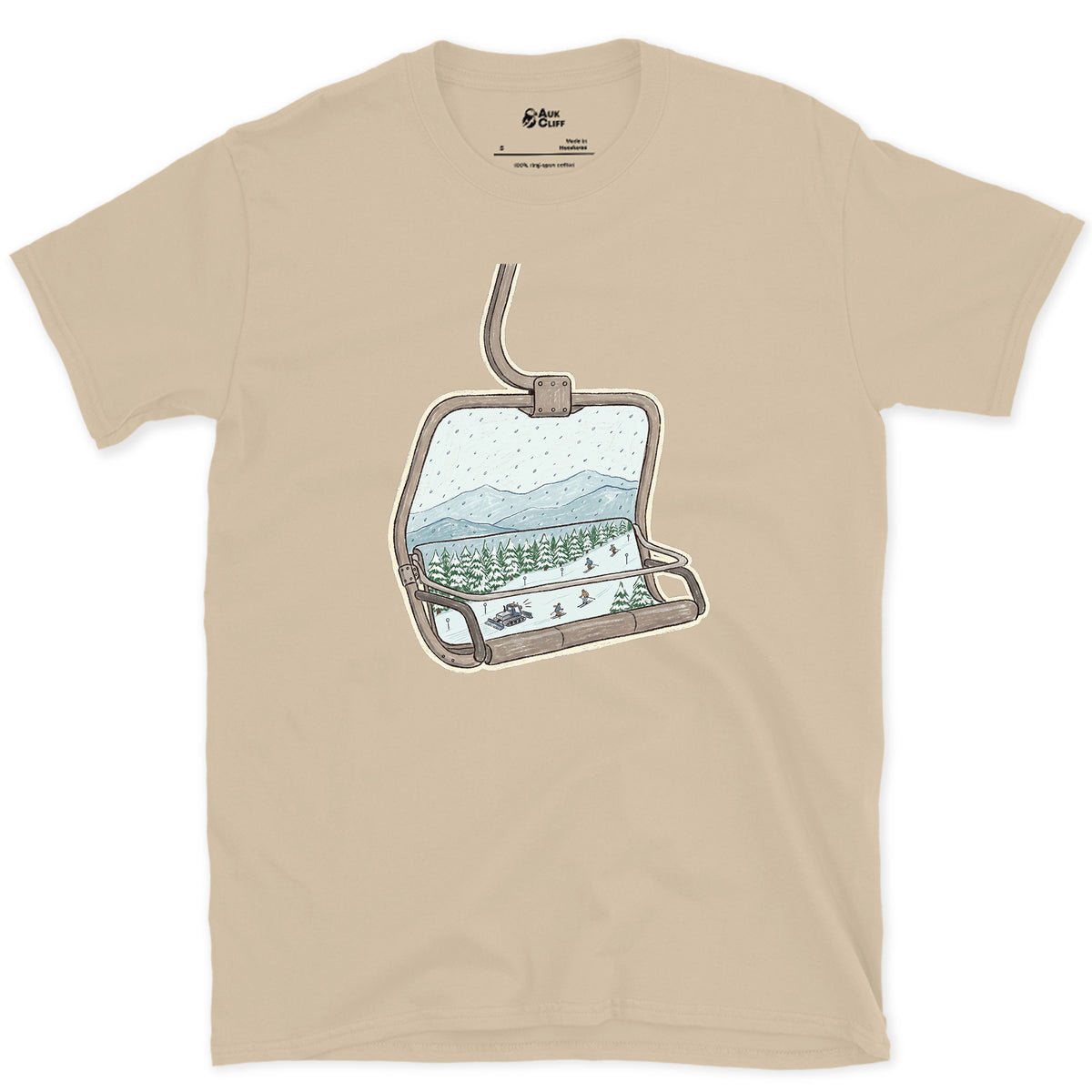 Riding Up Through the Snow, Chairlift design on a Sand Gildan Softstyle t-shirt