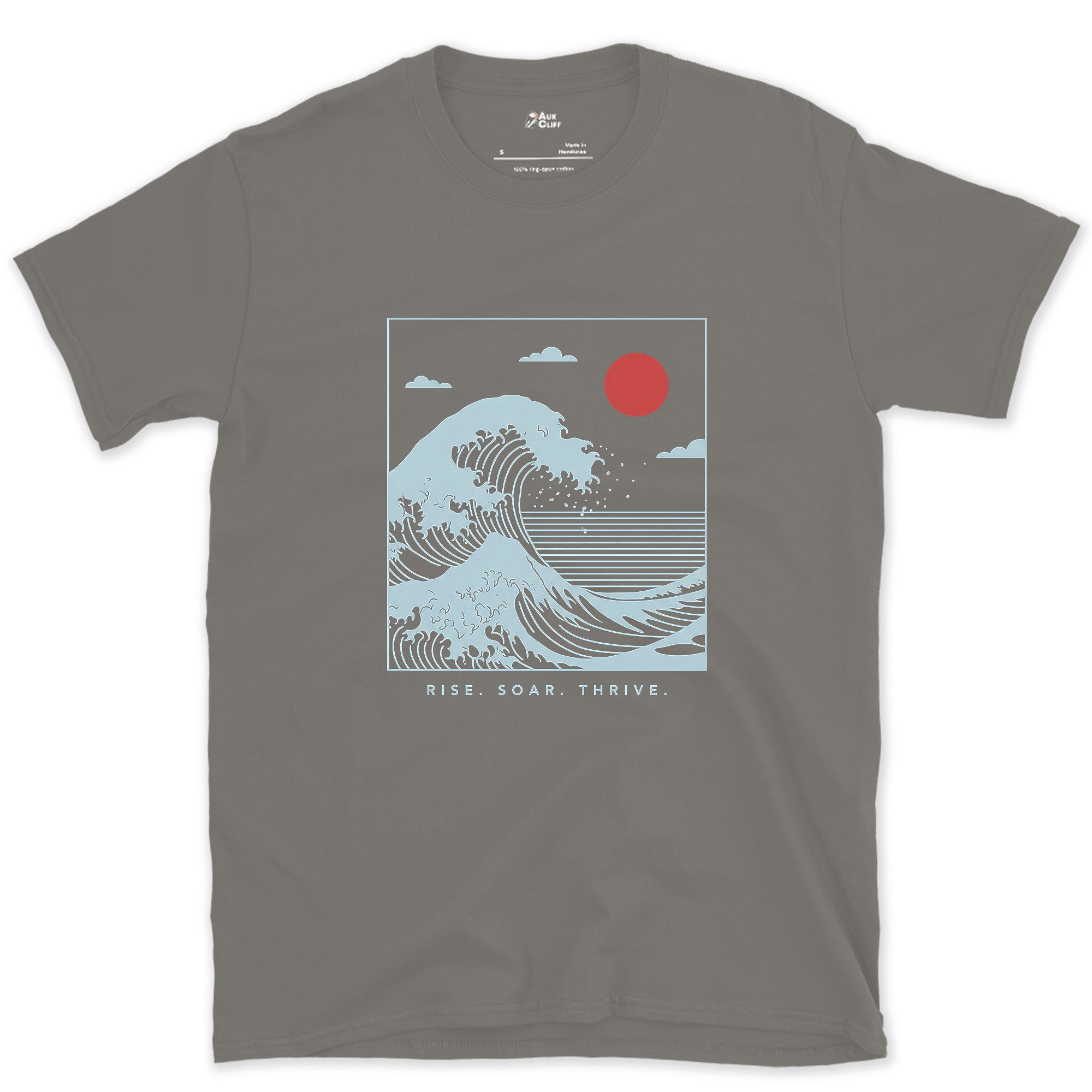 Rise, Soar, Thrive, the Cresting Wave design on a Charcoal Gildan Softstyle t-shirt