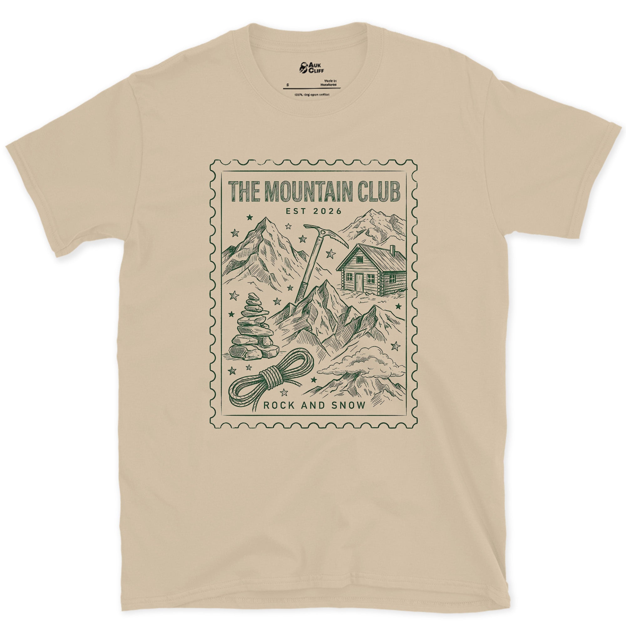The Mountain Club, Everything a Trip Requires design on a Sand Gildan Softstyle t-shirt