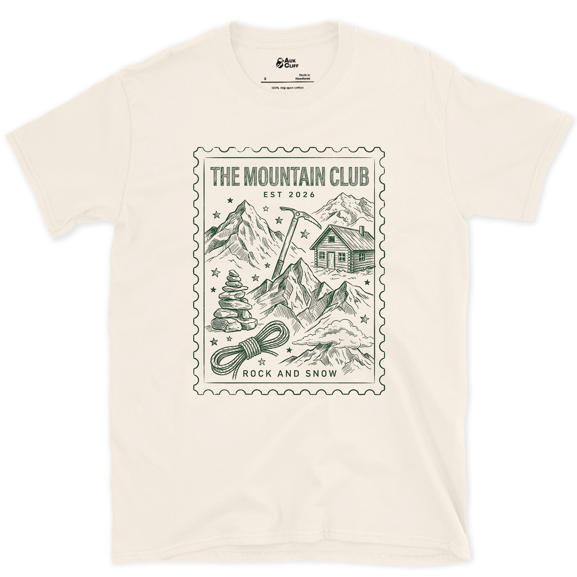 The Mountain Club, Everything a Trip Requires design on a Natural Gildan Softstyle t-shirt