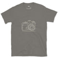 Still the Camera Shape Everyone Pictures First design on a Charcoal Gildan Softstyle t-shirt