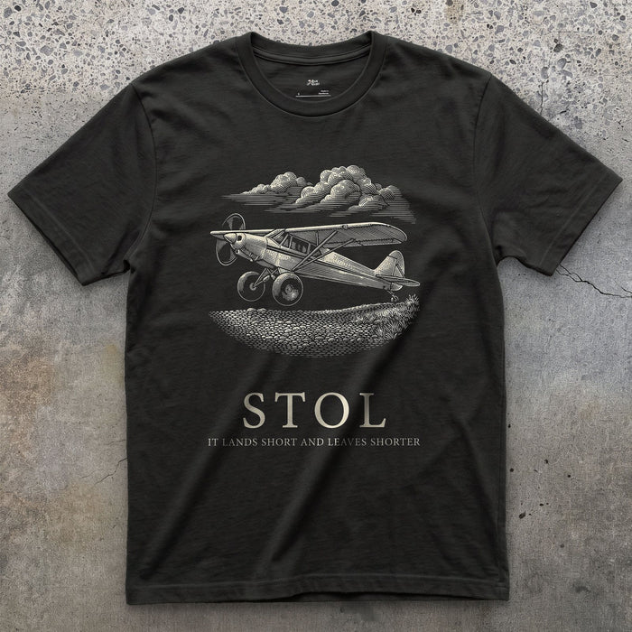 STOL, Short Take Off and Landing design on a Black Gildan Softstyle t-shirt
