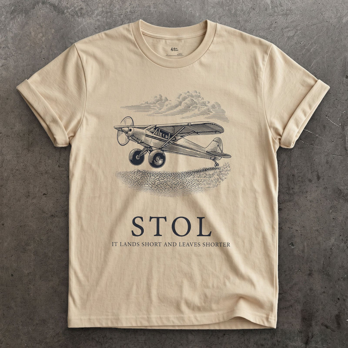 STOL, Short Take Off and Landing design on a Sand Gildan Softstyle t-shirt