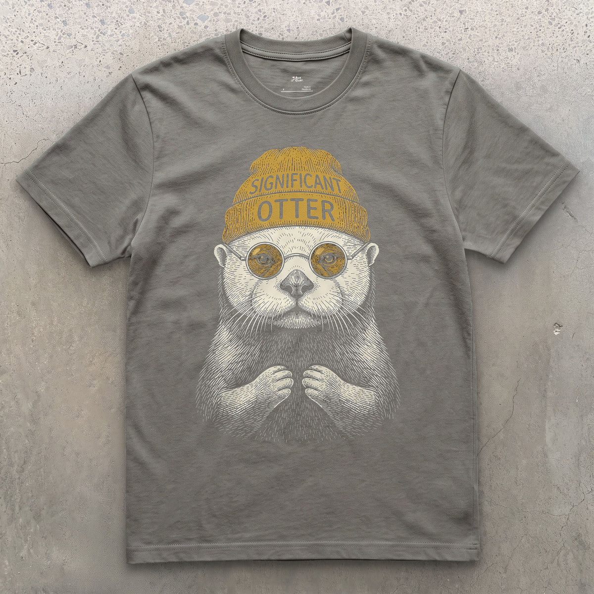 Significant Otter, Sea Otter in a Beanie design on a Charcoal Gildan Softstyle t-shirt