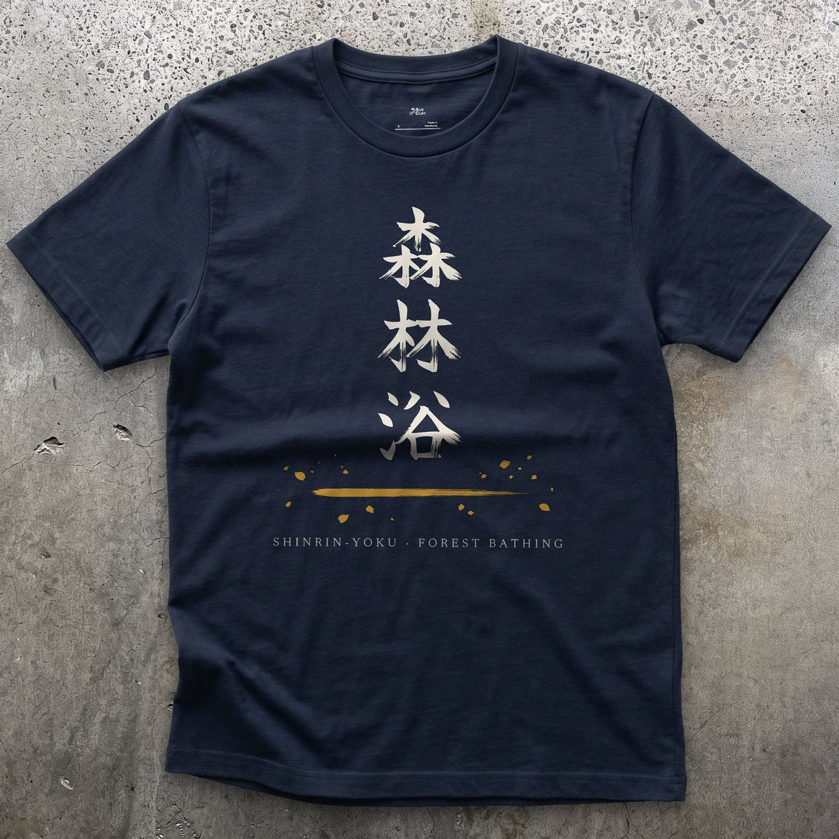 Shinrin Yoku in Japanese design on a Navy Gildan Softstyle t-shirt