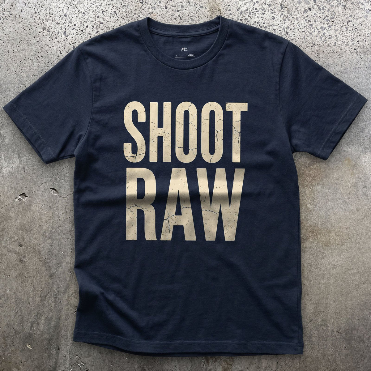 Shoot Raw, the Only Camera Setting design on a Navy Gildan Softstyle t-shirt