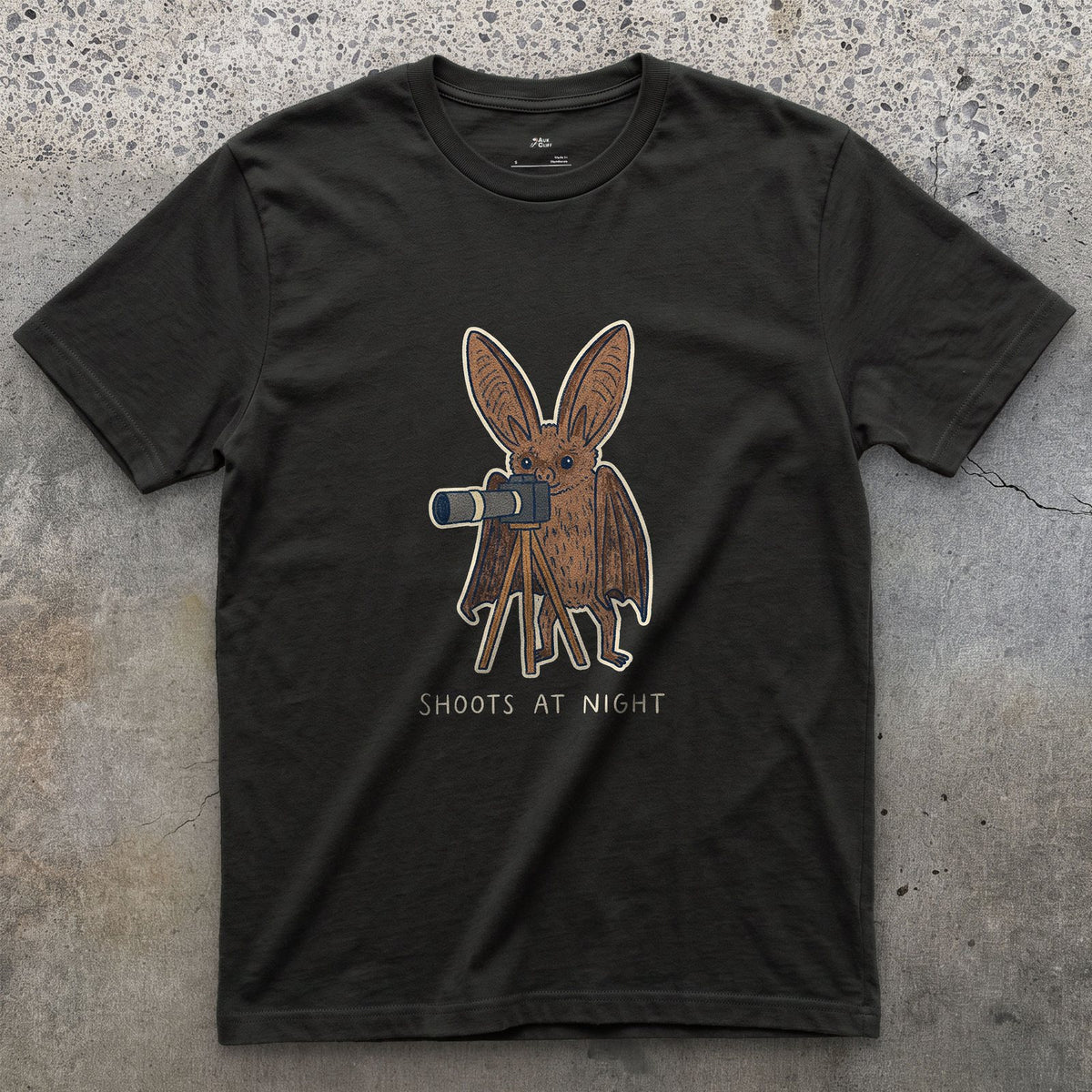 Bat Shoots at Night design on a Black Gildan Softstyle t-shirt