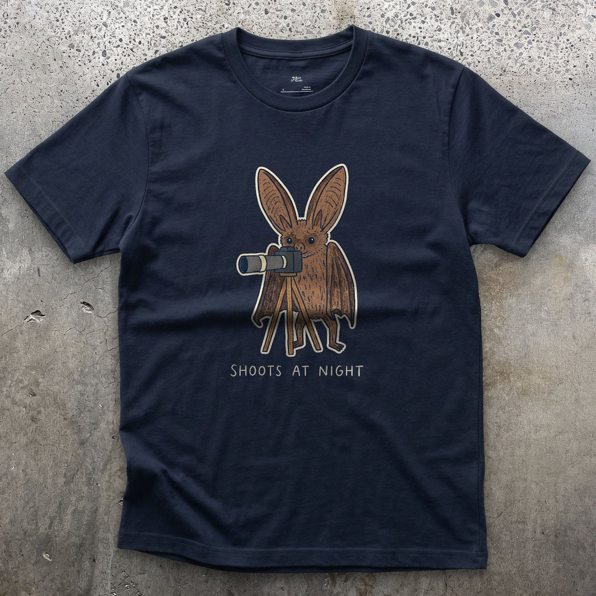 Bat Shoots at Night design on a Navy Gildan Softstyle t-shirt