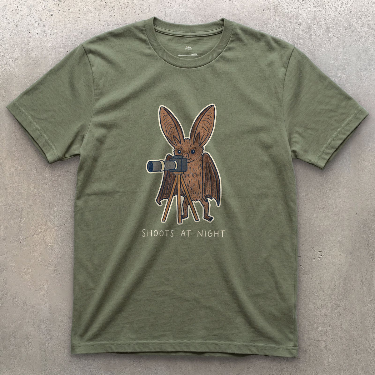 Bat Shoots at Night design on a Military Green Gildan Softstyle t-shirt