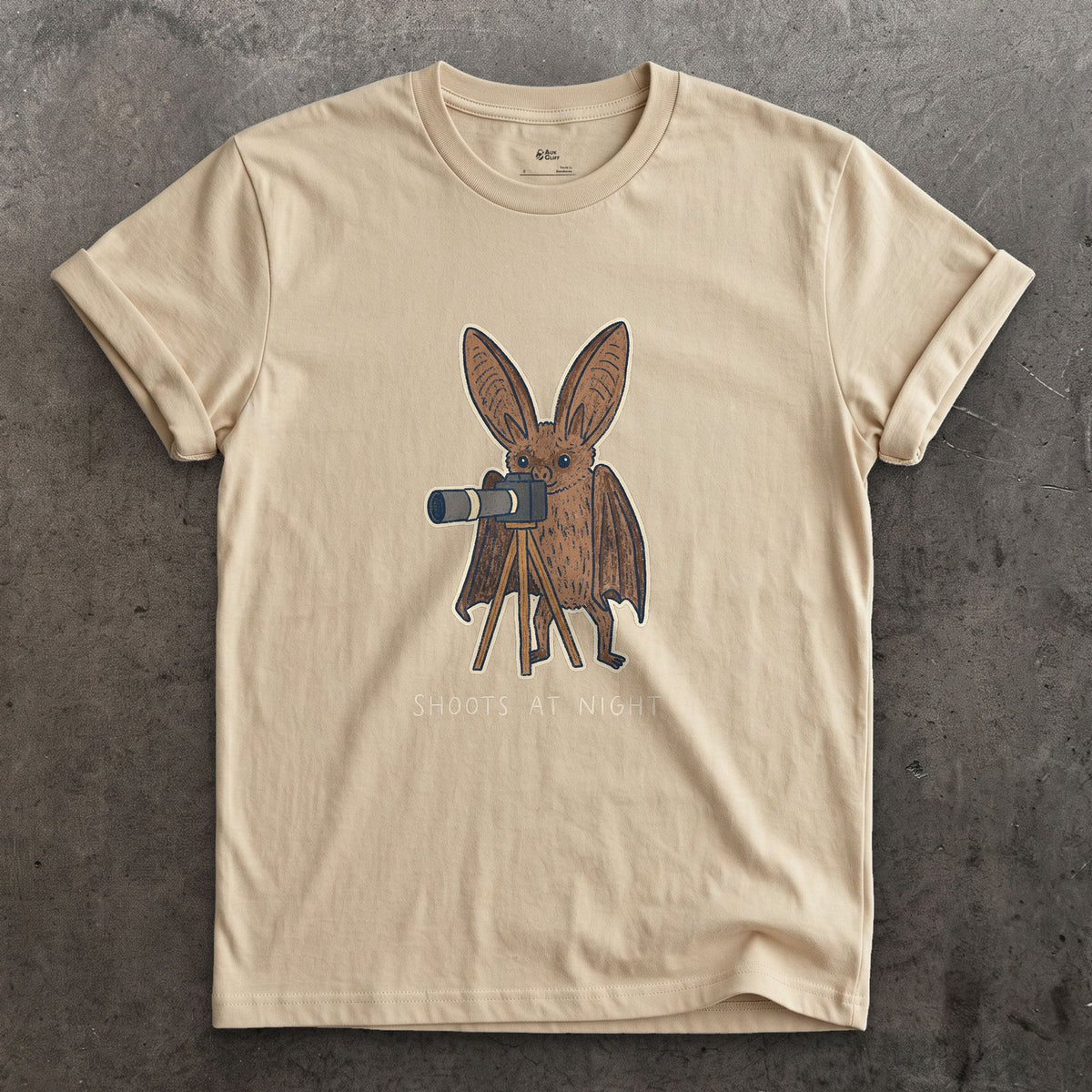 Bat Shoots at Night design on a Sand Gildan Softstyle t-shirt
