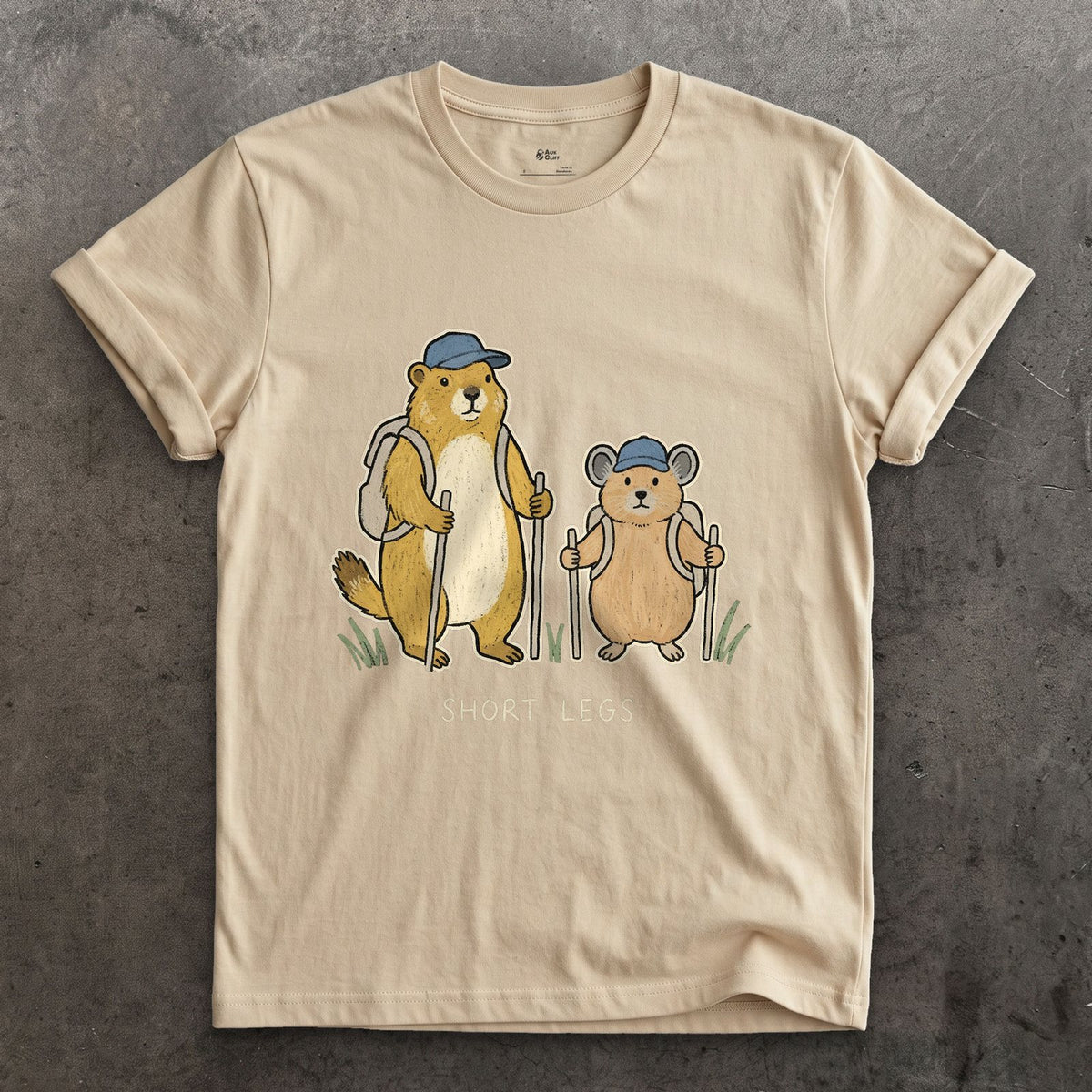 Short Legs, Marmot and Pika Hiking design on a Sand Gildan Softstyle t-shirt