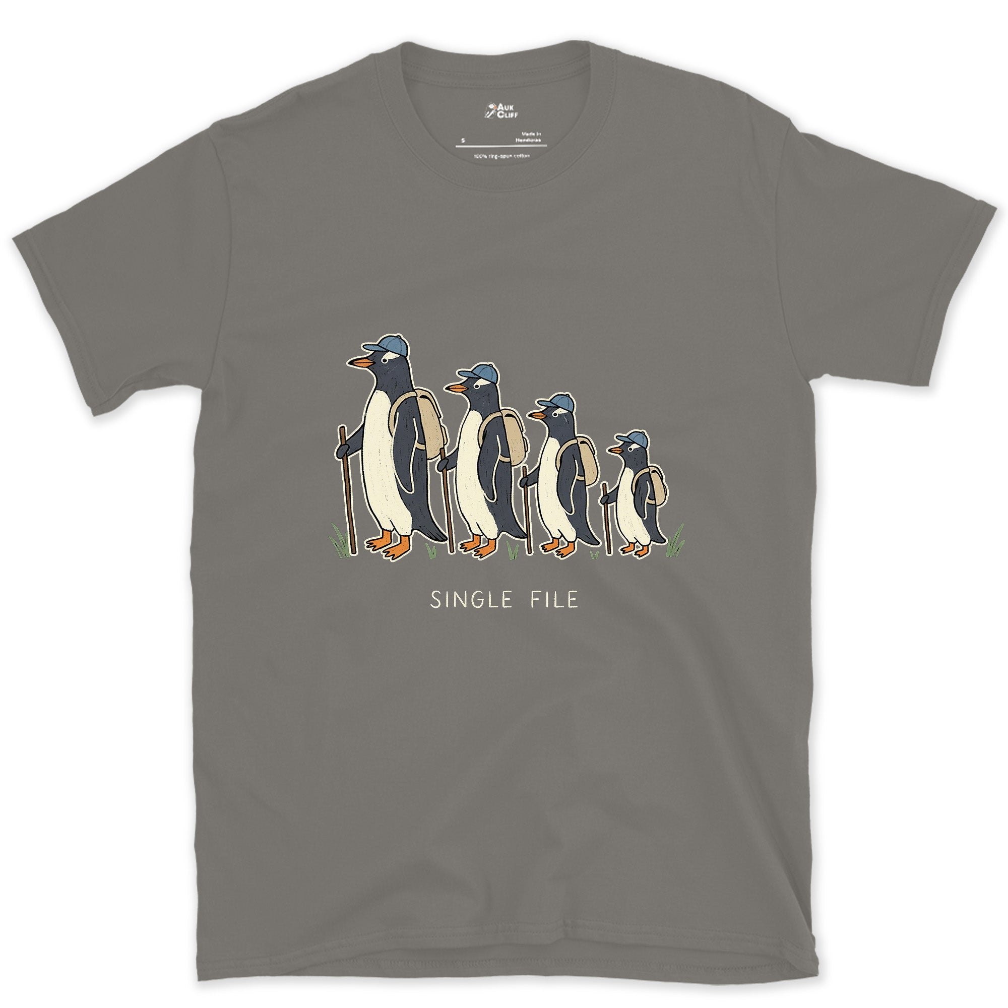 Single File, Penguins in the Same Track design on a Charcoal Gildan Softstyle t-shirt