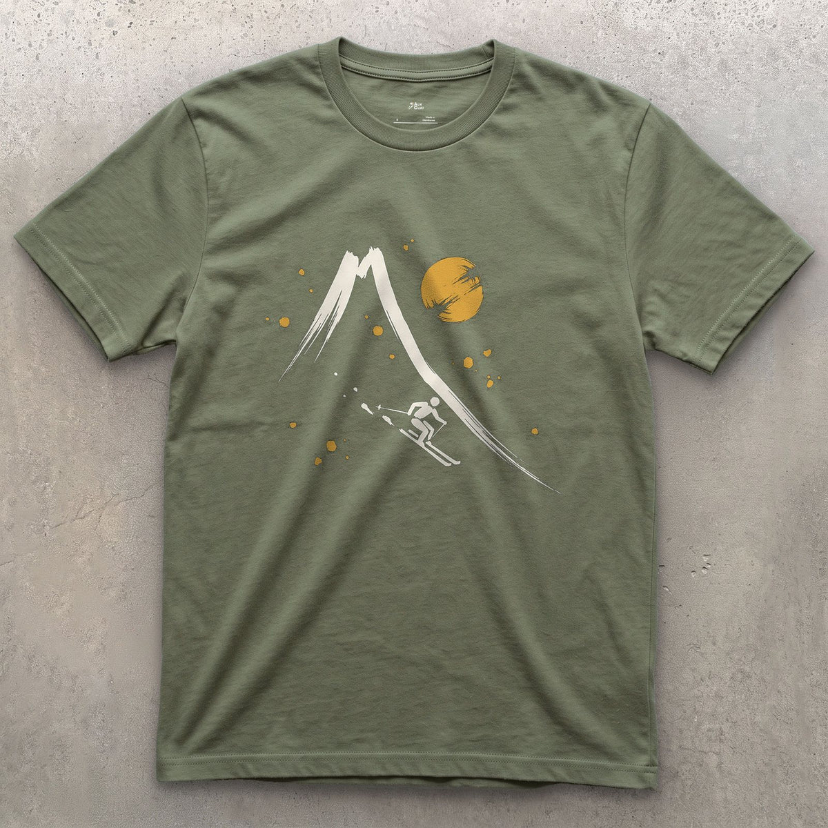 Skier Off the Peak design on a Military Green Gildan Softstyle t-shirt