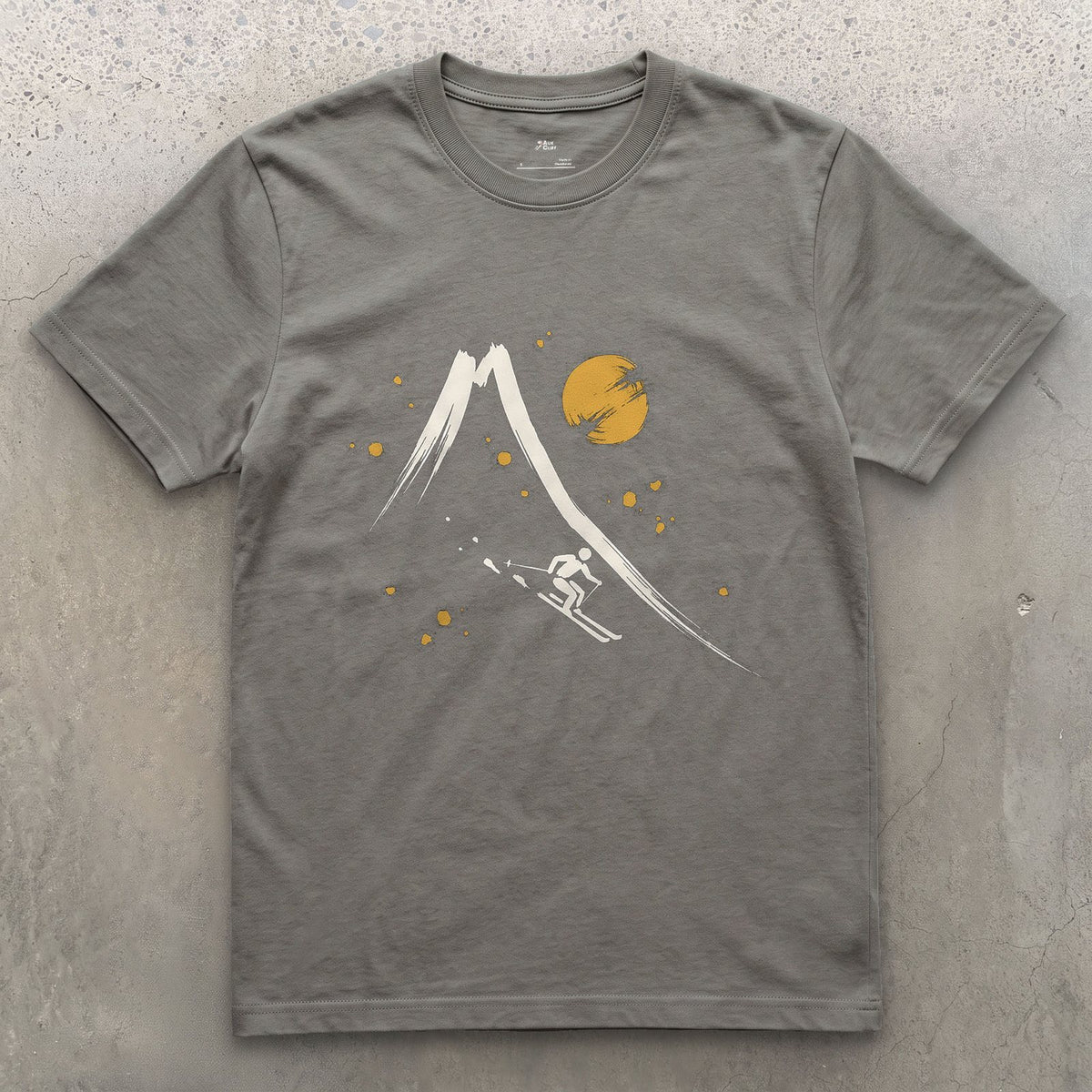 Skier Off the Peak design on a Charcoal Gildan Softstyle t-shirt