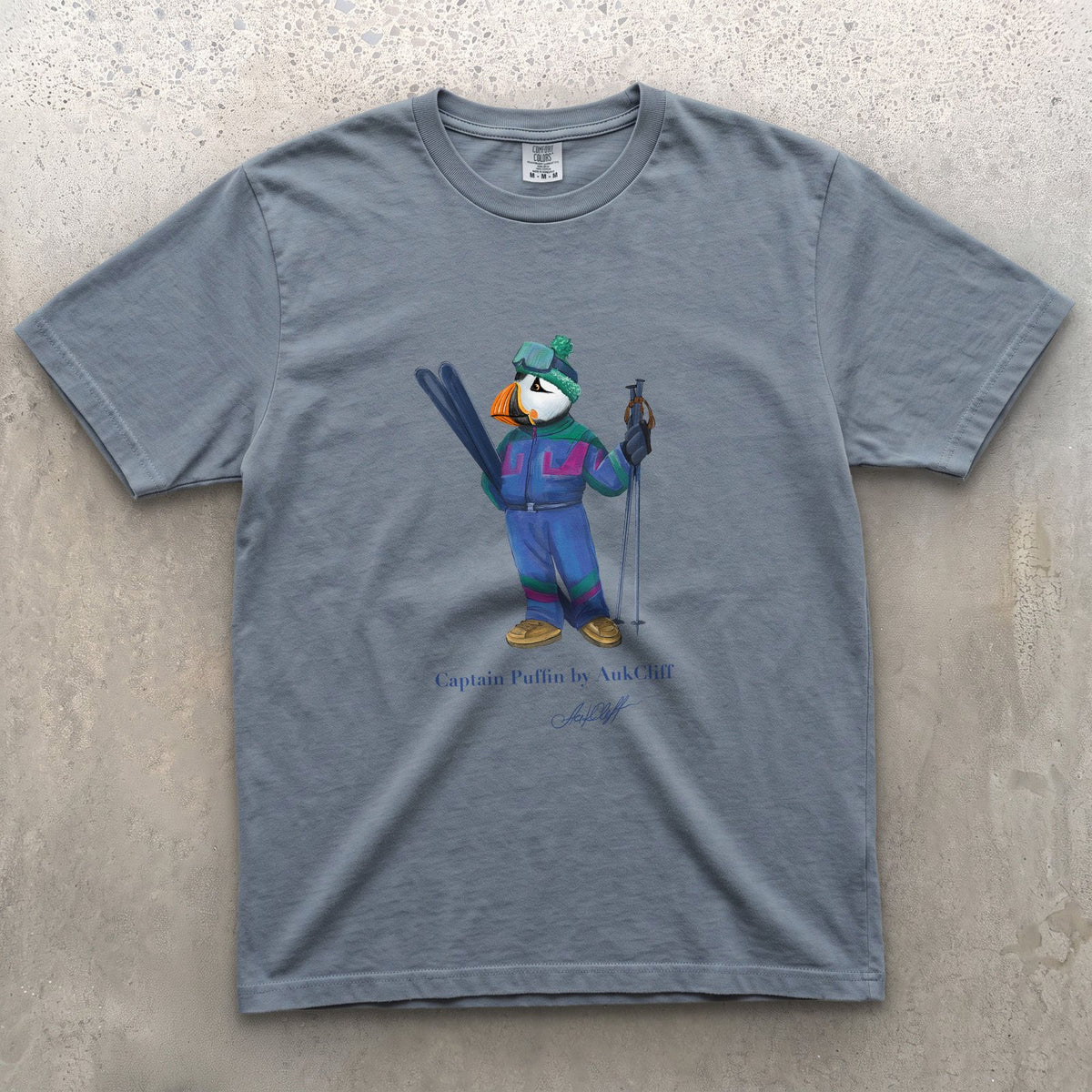 Captain Puffin Retro Ski on a Blue Jean Comfort Colors t-shirt