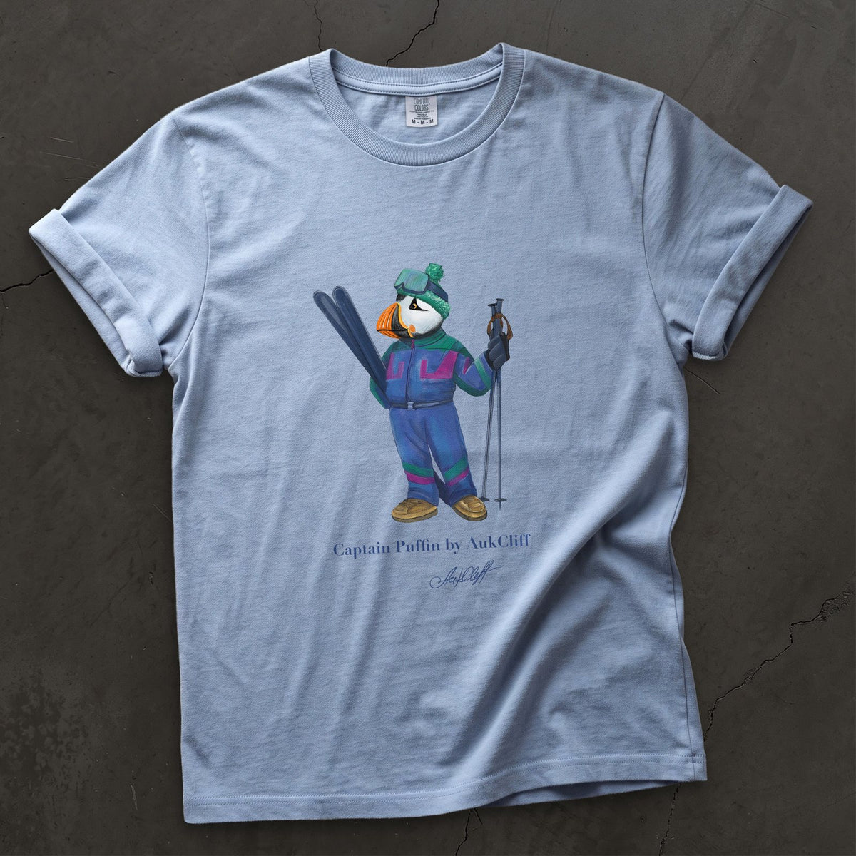 Captain Puffin Retro Ski on a Washed Denim Comfort Colors t-shirt