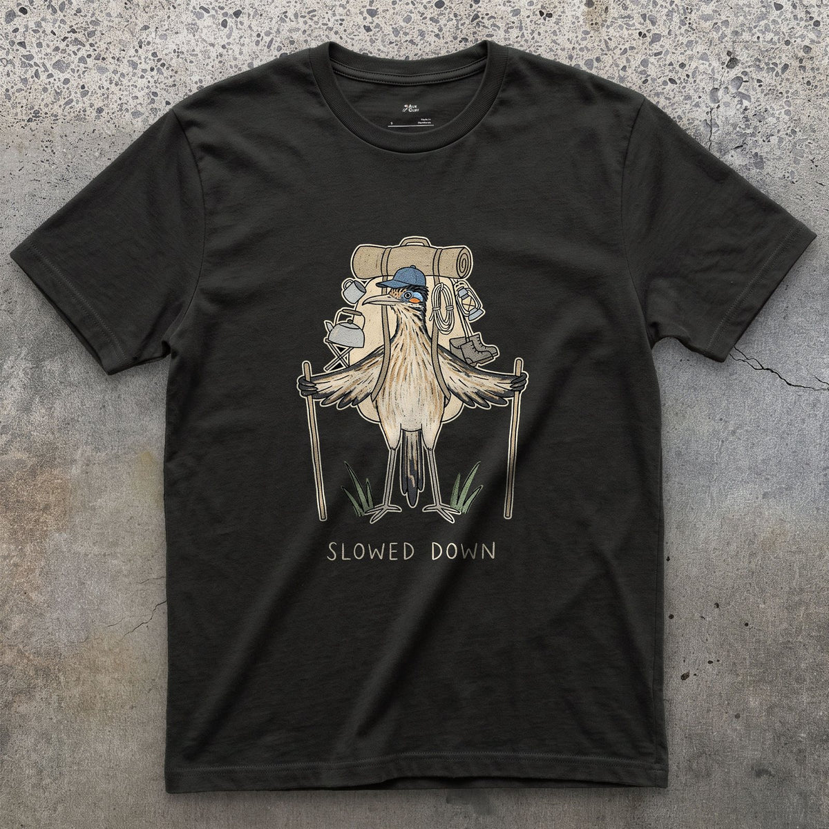Slowed Down, Roadrunner Hiker design on a Black Gildan Softstyle t-shirt