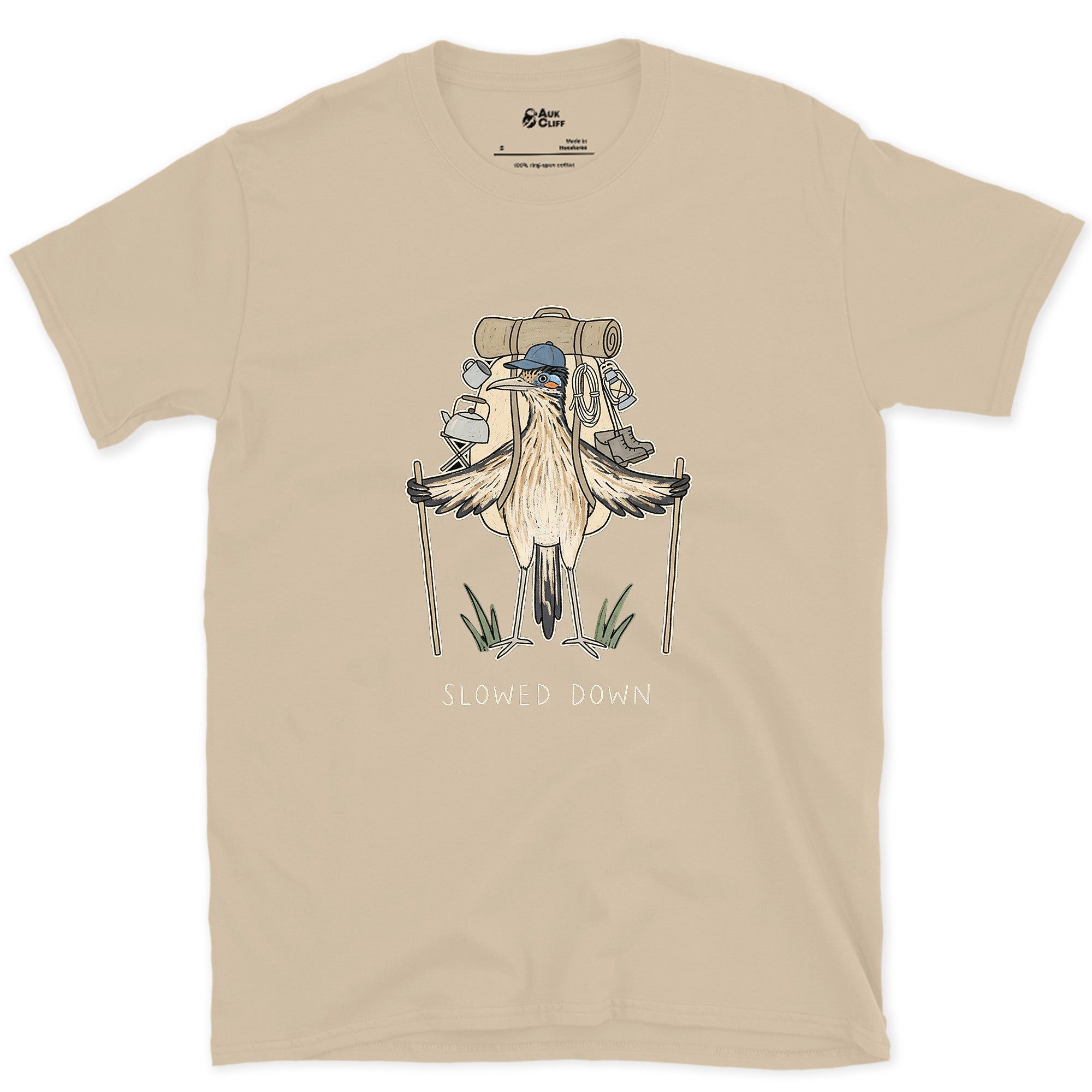 Slowed Down, Roadrunner Hiker design on a Sand Gildan Softstyle t-shirt