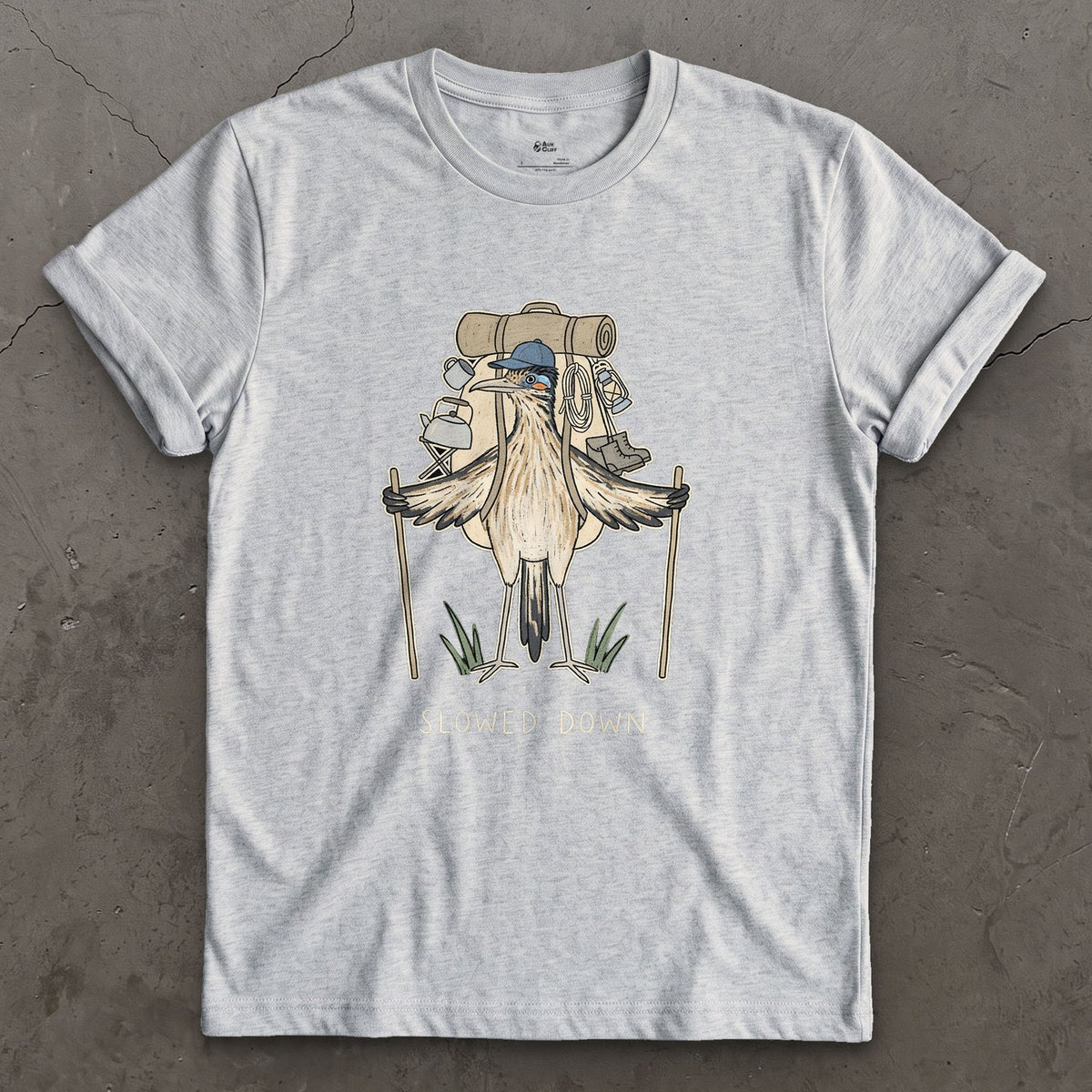 Slowed Down, Roadrunner Hiker design on a Sport Grey Gildan Softstyle t-shirt