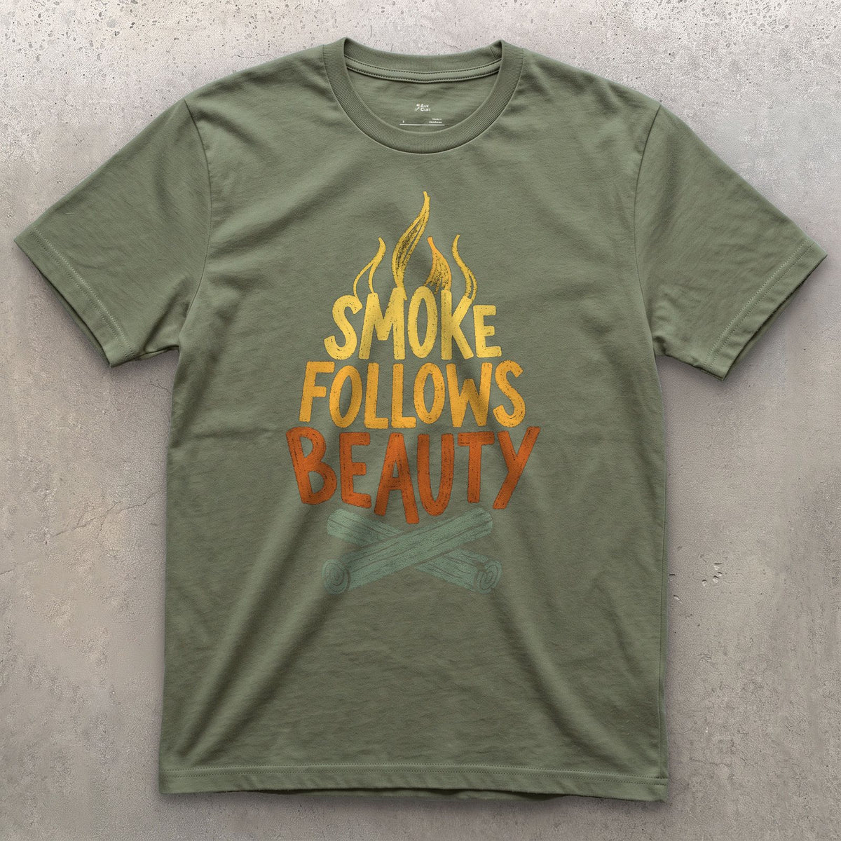 Smoke Follows Beauty, Camp Fire design on a Military Green Gildan Softstyle t-shirt