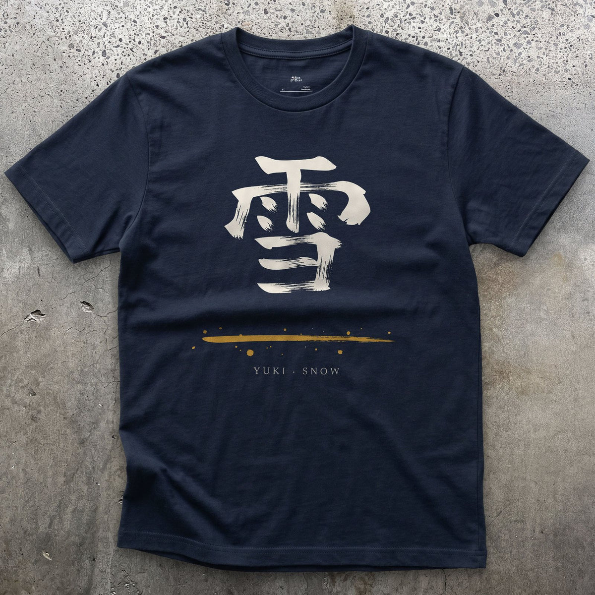 Snow in Japanese design on a Navy Gildan Softstyle t-shirt