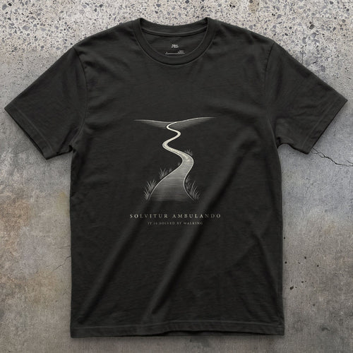 Solvitur Ambulando, It Is Solved by Walking design on a Black Gildan Softstyle t-shirt