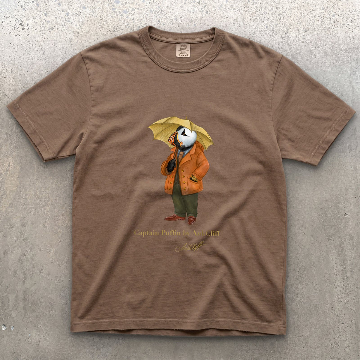 Captain Puffin The Spring Wanderer on a Espresso Comfort Colors t-shirt