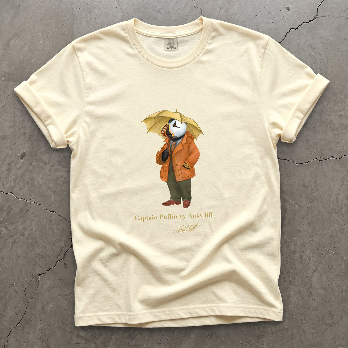 Captain Puffin The Spring Wanderer on a Ivory Comfort Colors t-shirt