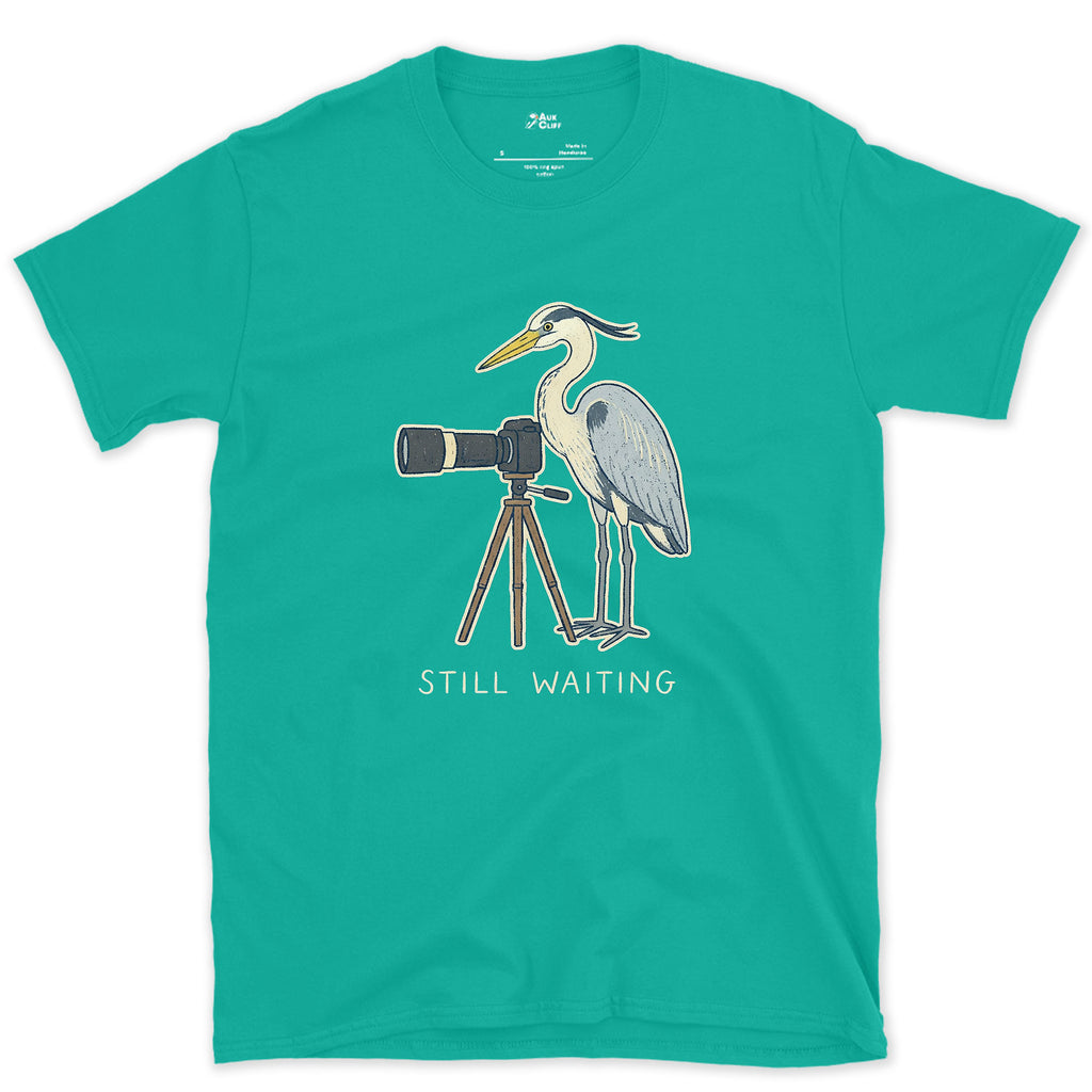 Still Waiting on the Tripod, a Heron Habit design on a Jade Dome Gildan Softstyle t-shirt