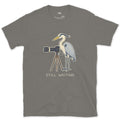 Still Waiting on the Tripod, a Heron Habit design on a Charcoal Gildan Softstyle t-shirt