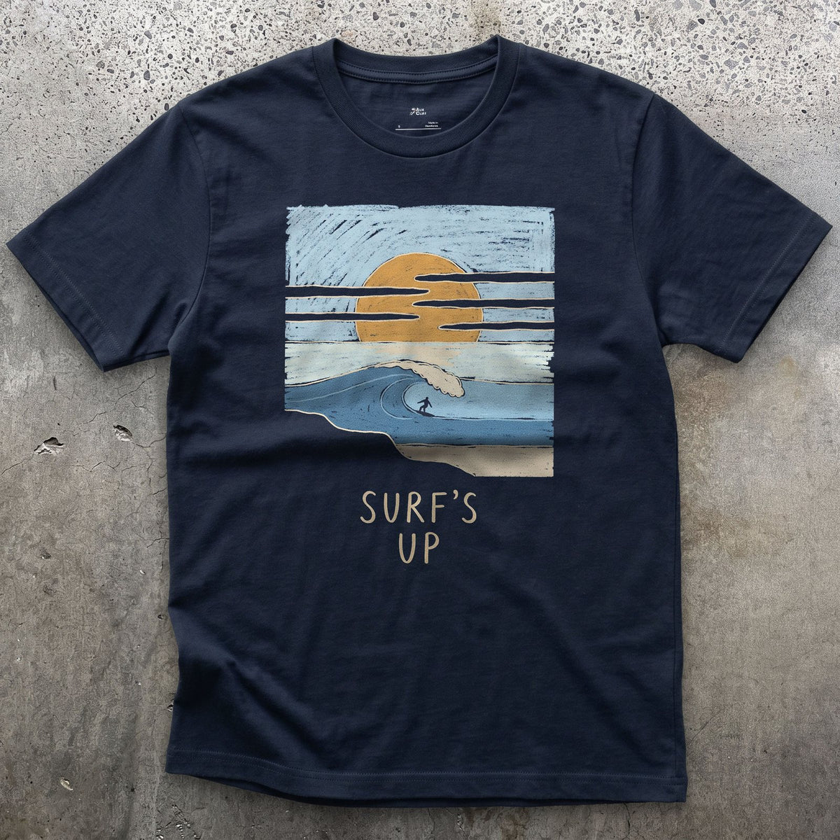 Surf's Up, Rider at Sunset design on a Navy Gildan Softstyle t-shirt