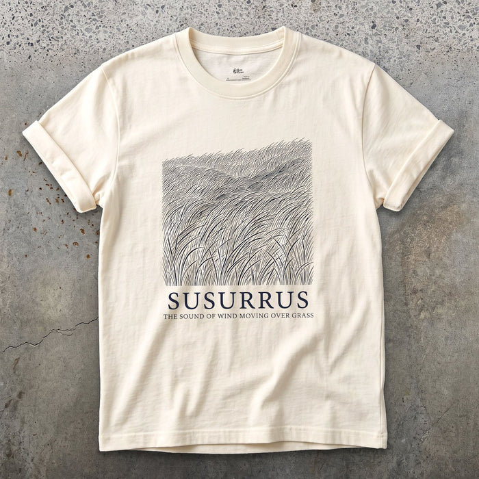 Susurrus, the Sound of Wind Moving Over Grass design on a Natural Gildan Softstyle t-shirt