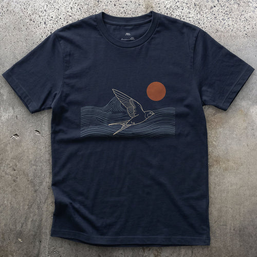 A Few Clean Lines, Swallow Above the Waves design on a Navy Gildan Softstyle t-shirt