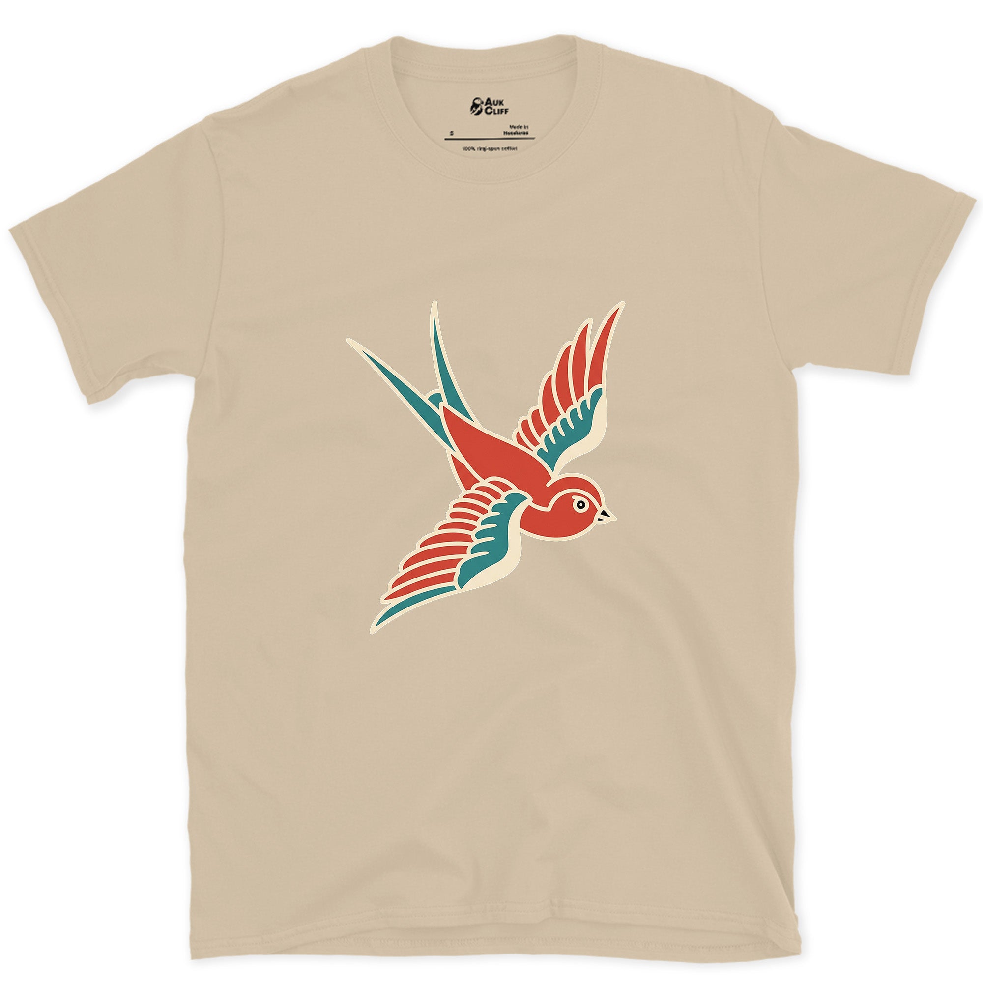A Swallow in Bold Traditional Ink, Dark design on a Sand Gildan Softstyle t-shirt
