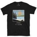Take It Slow, Angler Under the Pines design on a Black Gildan Softstyle t-shirt