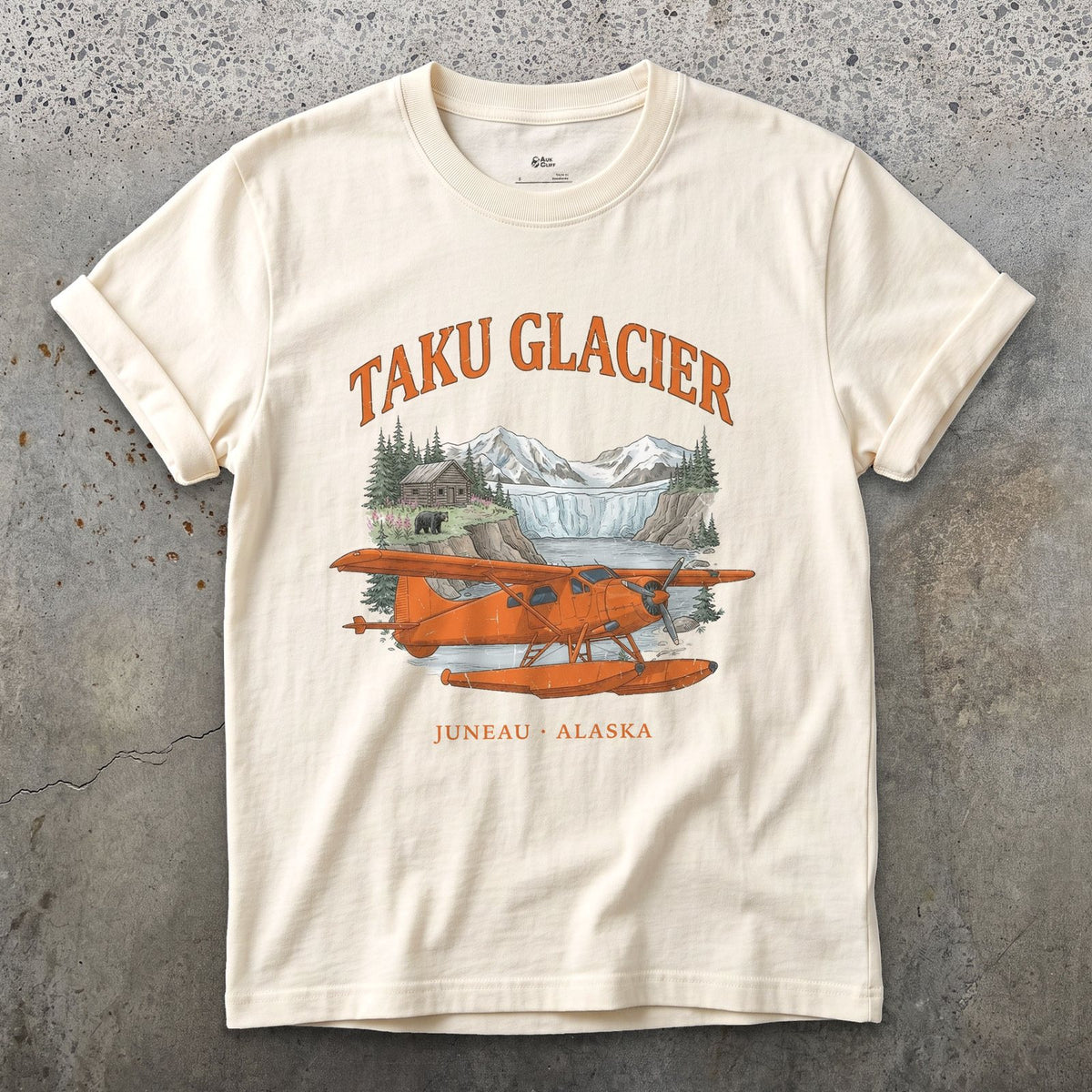 Taku Glacier Bush Plane design on a Natural Gildan Softstyle t-shirt