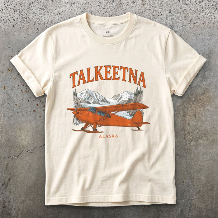 Talkeetna Bush Plane design on a Natural Gildan Softstyle t-shirt