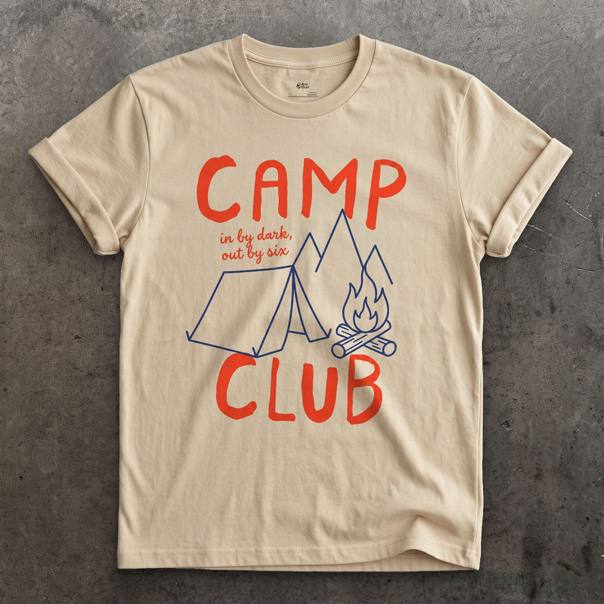 In By Dark, Out By Six, Camp Club design on a Sand Gildan Softstyle t-shirt