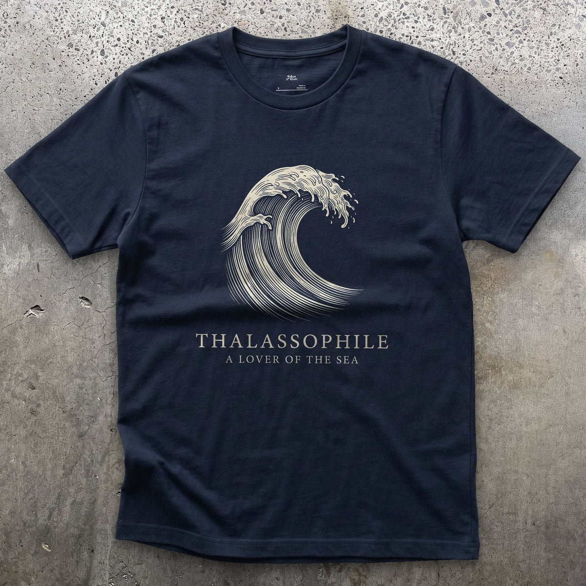 Thalassophile, a Lover of the Sea design on a Navy Gildan Softstyle t-shirt