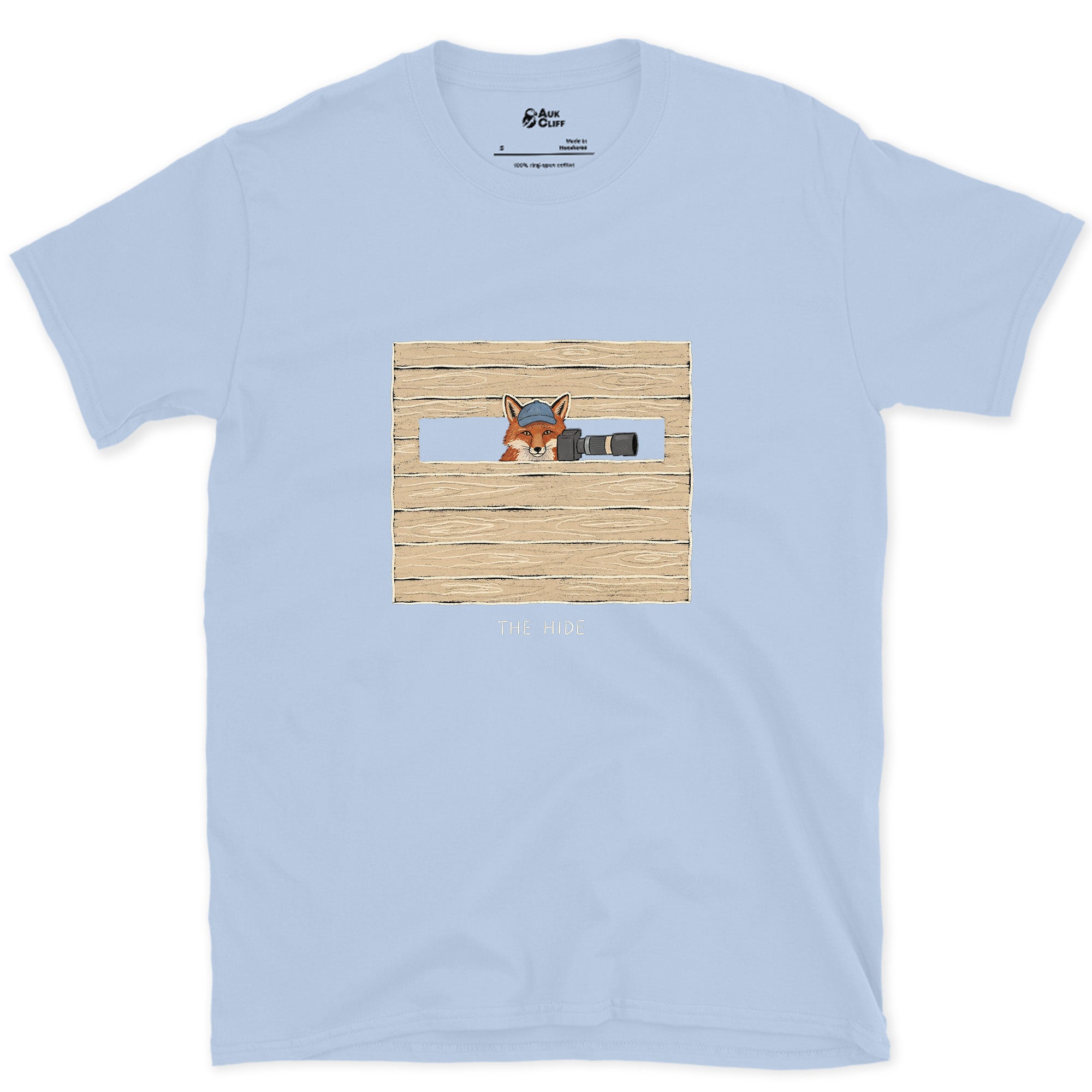 Claimed the Good Spot First, Fox in the Hide design on a Light Blue Gildan Softstyle t-shirt