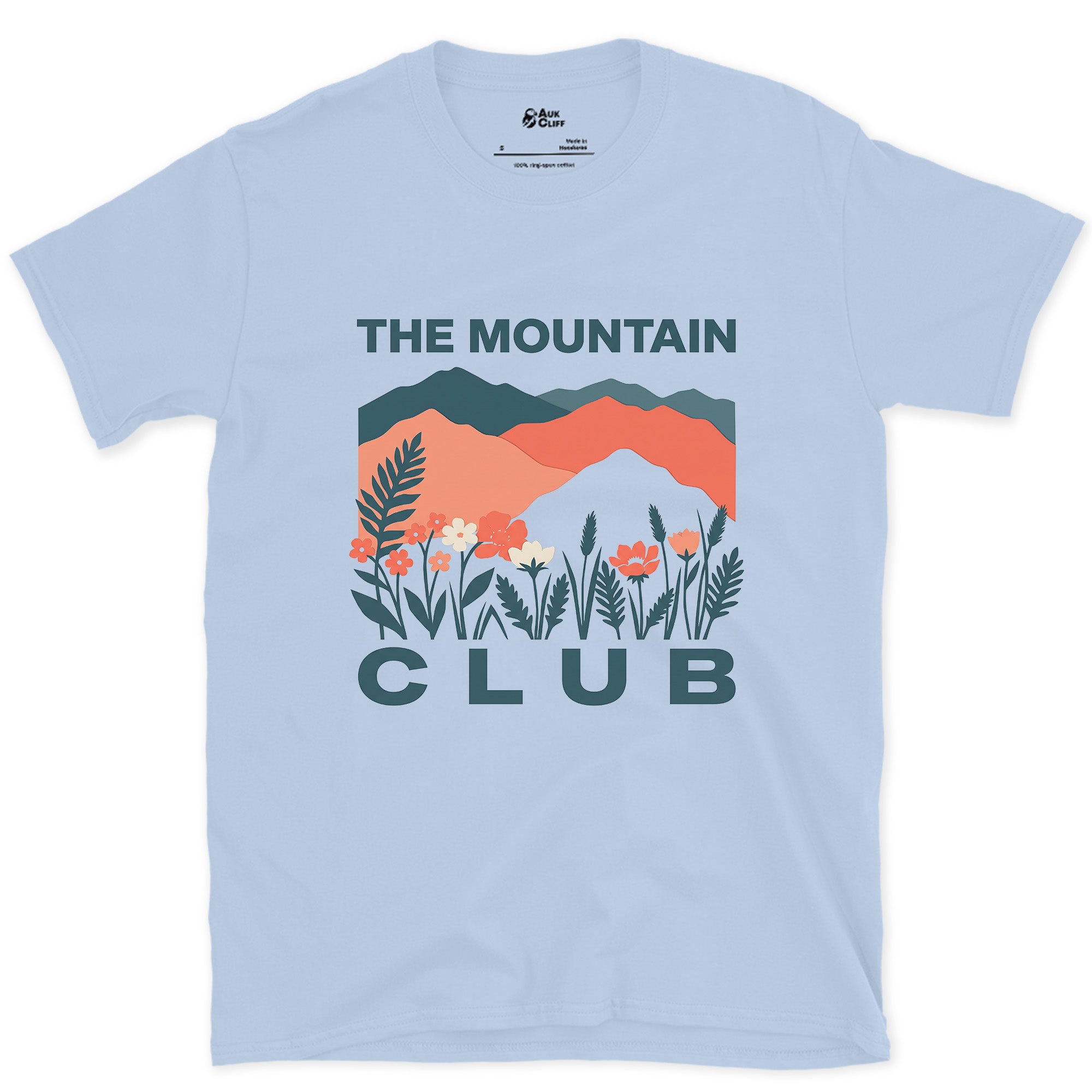 Blue and Coral Ranges Over Ferns design on a Light Blue Gildan Softstyle t-shirt
