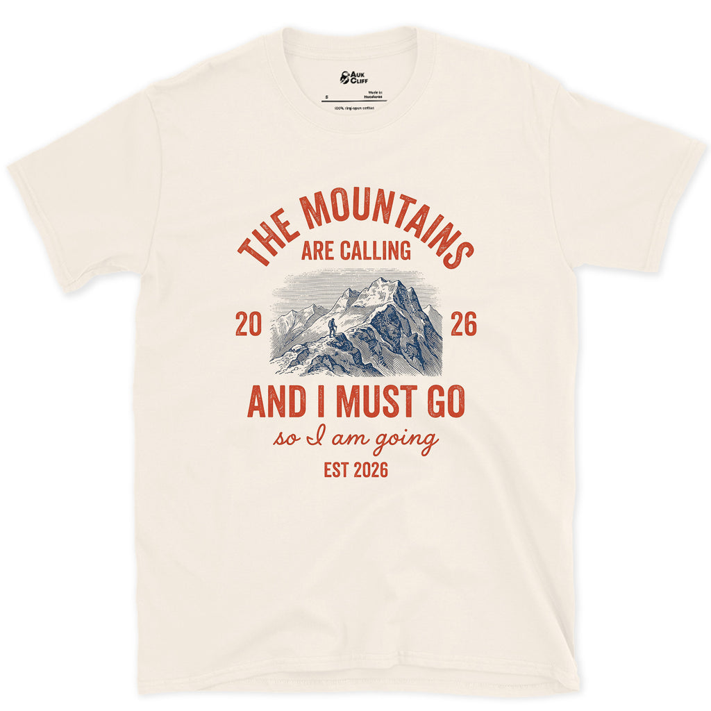 The Mountains Are Calling, So I Am Going design on a Natural Gildan Softstyle t-shirt
