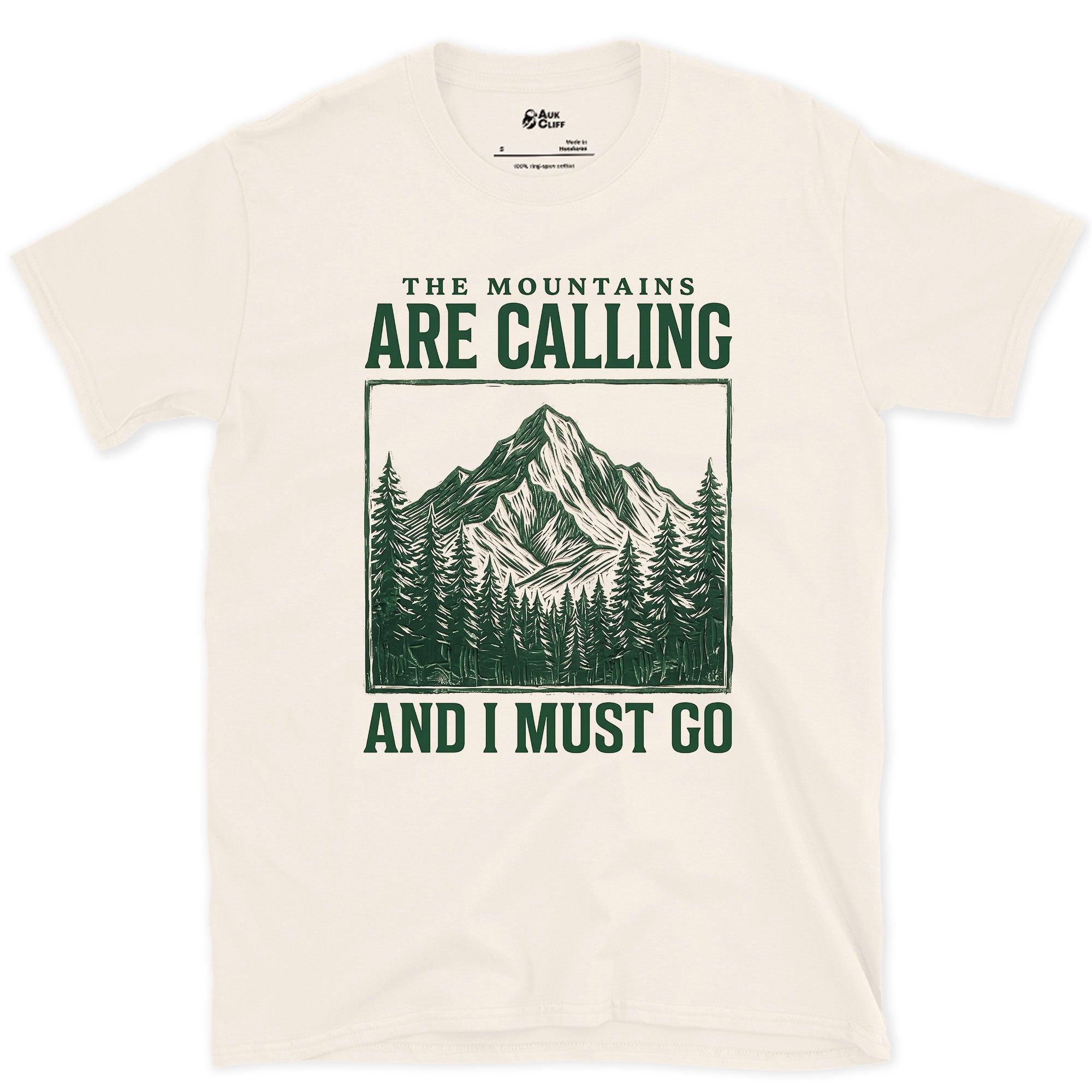 The Mountains Are Calling design on a Natural Gildan Softstyle t-shirt